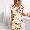 Camille | Elegant, flowing white dress with ruffles