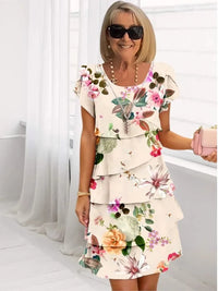 Camille | Elegant, flowing white dress with ruffles